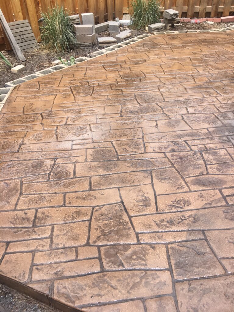 Stamped concrete patio with an ashlar stone pattern